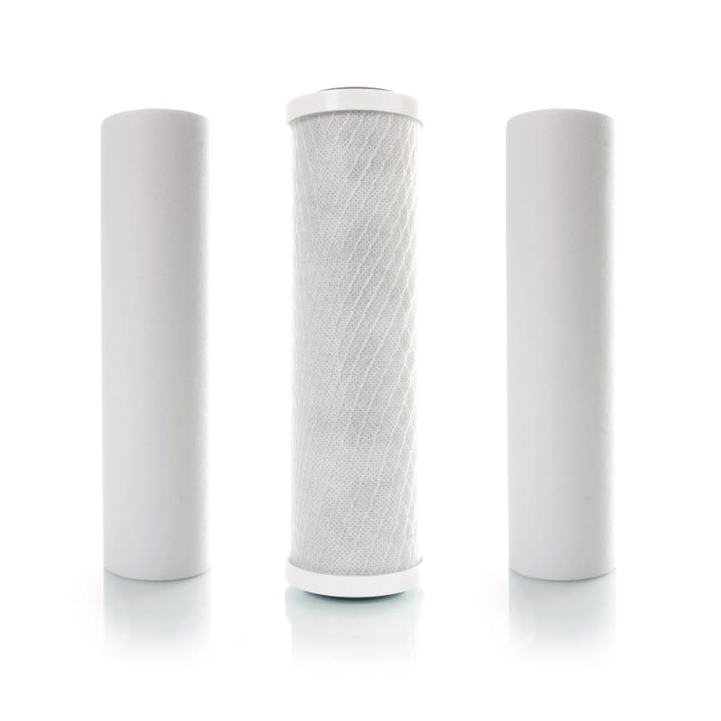 Prefilter Set 10 Inch - Three standing cylindrical prefilters in 10 inch side by side. Sediment filter one is white, the second filter is a carbon block filter in light gray with a honeycomb-like mesh structure, the third pre-filter is again a sediment filter in white, but finer in filtration than filter 1.