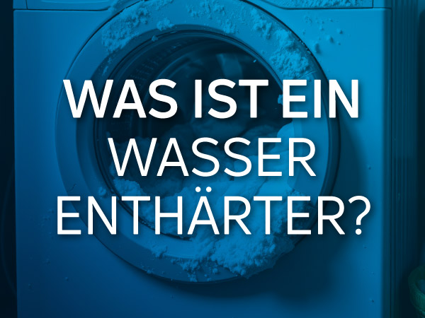 Was ist ein Wasserenthärter? Im Bild ist eine Waschmaschine zu sehen, auf der sich Kalk abgelagert hat.